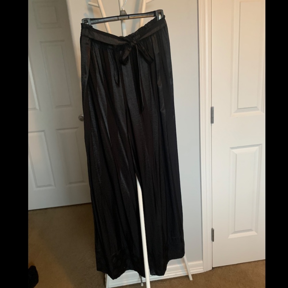 black stripped pants w/ polka dot bottom